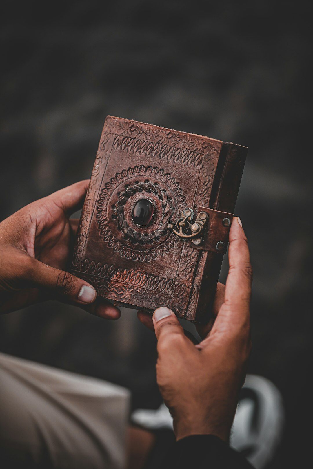 person holding mystery book